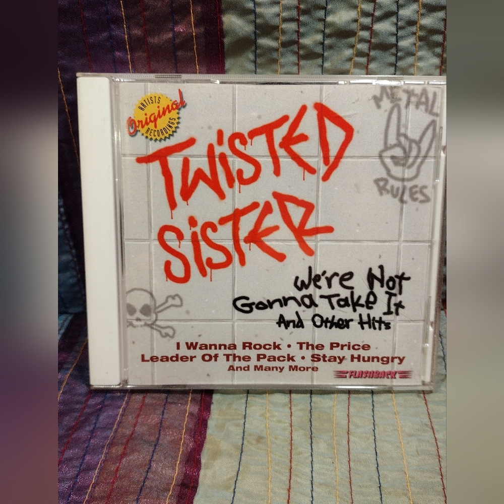 Twisted Sister CD ( WE'RE NOT GONNA TAKE IT AND OTHER HITS )